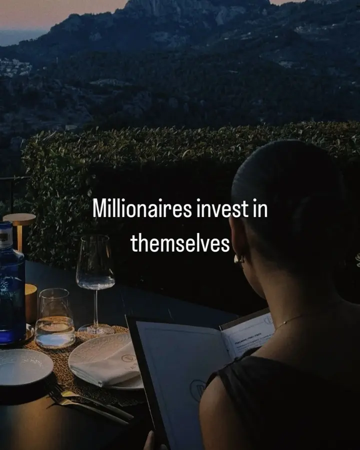A woman reading a menu at a candlelit dinner with the words “Millionaires invest in themselves”